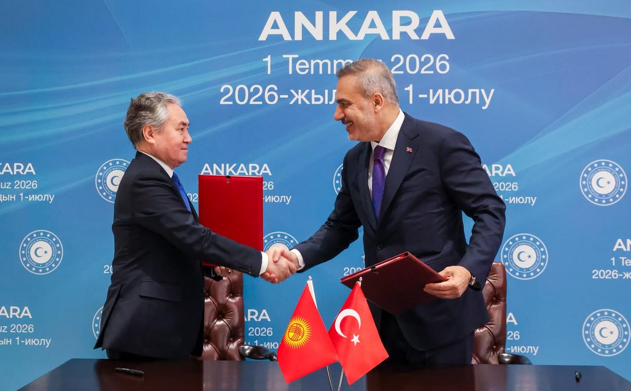 Turkish Foreign Minister Hakan Fidan (R) and Kyrgyz Foreign Minister Jeenbek Kulubaev (L) sign the "2027-2028 Cooperation Program between the Ministry of Foreign Affairs of the Republic of Turkiye and the Ministry of Foreign Affairs of the Kyrgyz Republic" following the Seventh Meeting of the Turkiye-Kyrgyzstan Joint Strategic Planning Group in Ankara, TÜrkiye on July 01, 2026. (Turkish Foreign Ministry / Handout / AA Photo)