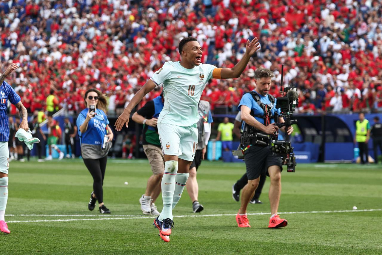 France's forward #10 Kylian Mbappe celebrates after winning the 2026 World Cup football tournament quarter-final match between France and Morocco at Boston Stadium in Foxborough on July 9, 2026. (AFP Photo)
