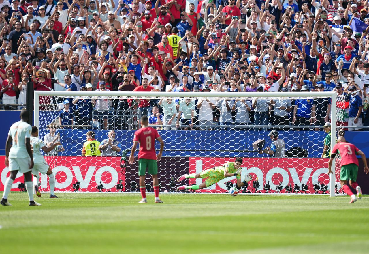 Yassine Bounou of Morocco stops the penalty shooted by Kylian Mbappe of France during the 2026 FIFA World Cup Quarter Final match between France and Morocco at Boston Stadium (Gillette Stadium) in Foxborough, Massachusetts, United States, July 9, 2026. (AA Photo)