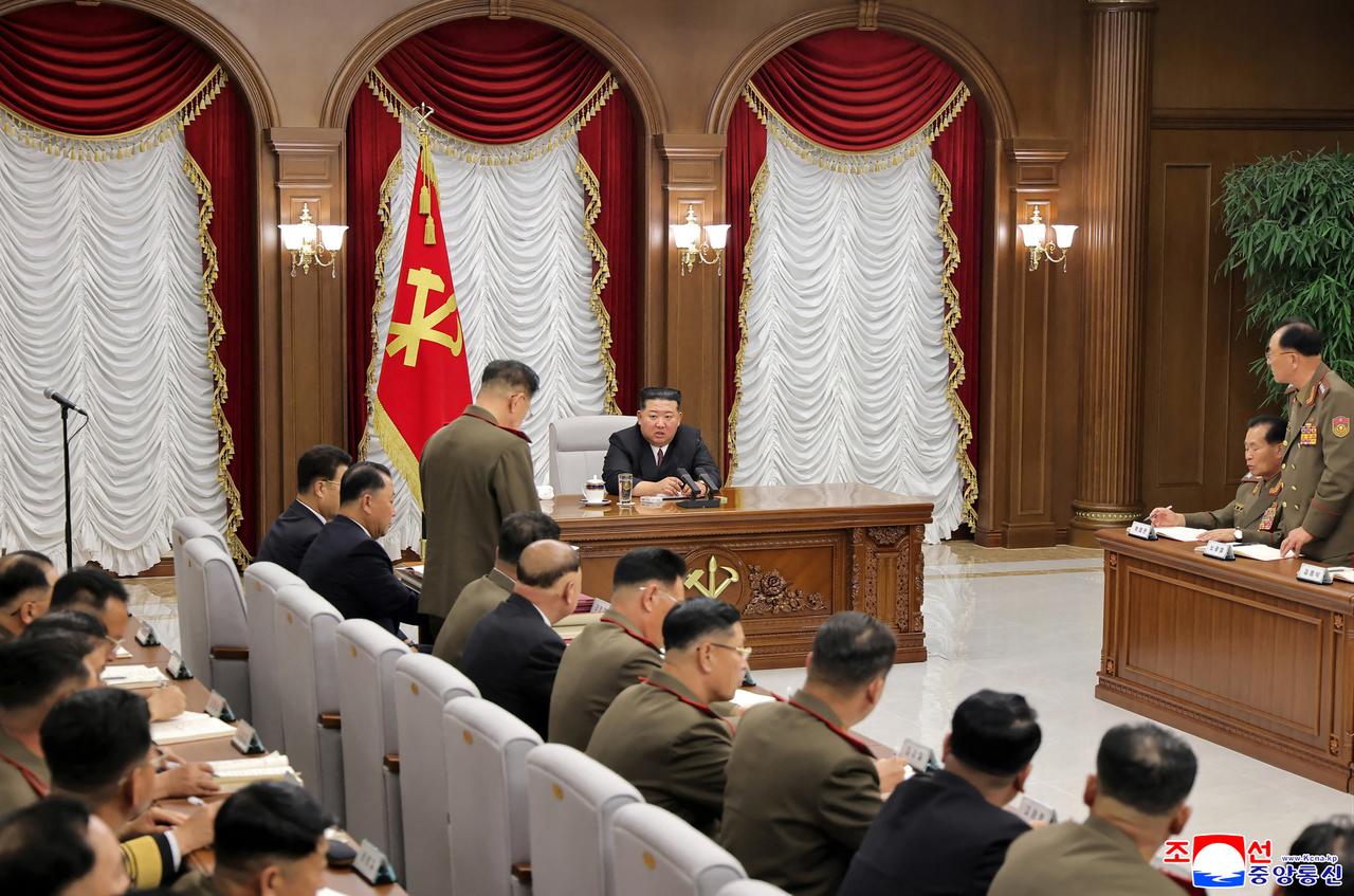 This picture taken on July 9, 2026 and released by North Korea's official Korean Central News Agency (KCNA) on July 10, 2026 shows North Korean leader Kim Jong Un attending the First Enlarged Meeting of the Ninth Central Military Commission of the Workers' Party of Korea at the government complex No. 1 in Pyongyang. (Photo by KCNA via KNS/AFP)