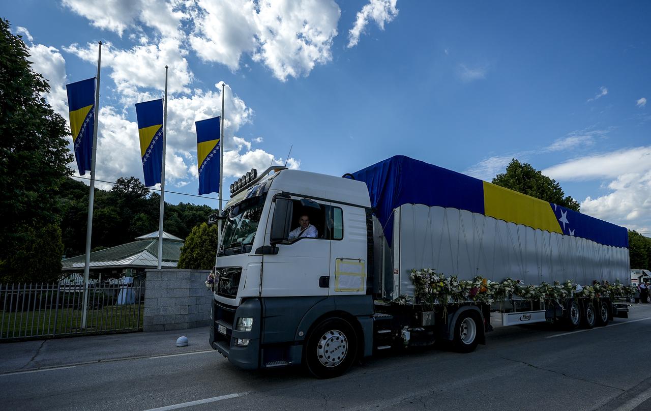 A convoy carrying ten coffins with the remains of victims of the 1995 Srebrenica genocide arrives at the Memorial Center July 09, 2026. (AA Photo )