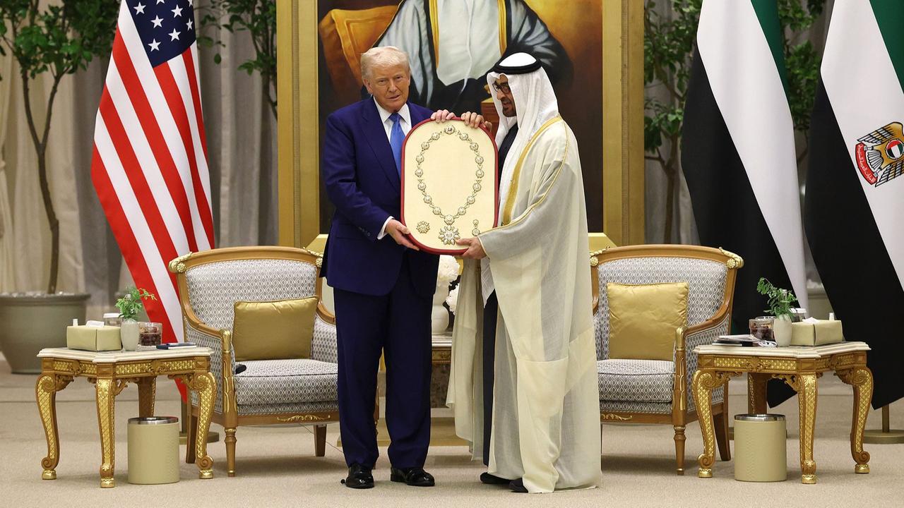 U.S. President Donald Trump receives a ceremonial gift from UAE President Sheikh Mohamed bin Zayed Al Nahyan during a meeting in Abu Dhabi, United Arab Emirates, May 16, 2025. (AFP Photo)