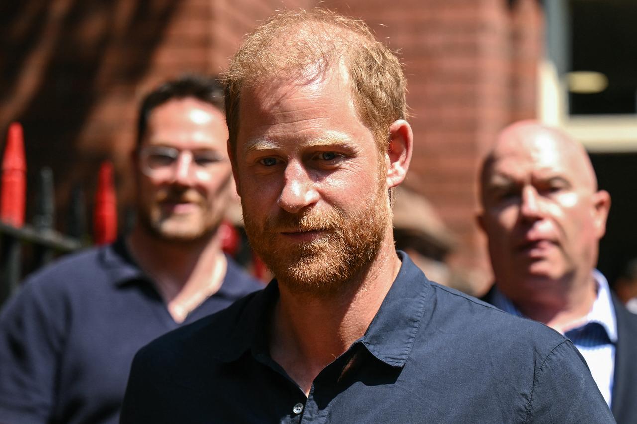 Britain's Prince Harry, Duke of Sussex (C), leaves following a visit to Birmingham Children’s Hospital in the city of Birmingham, England, July 9, 2026. (AFP Photo)