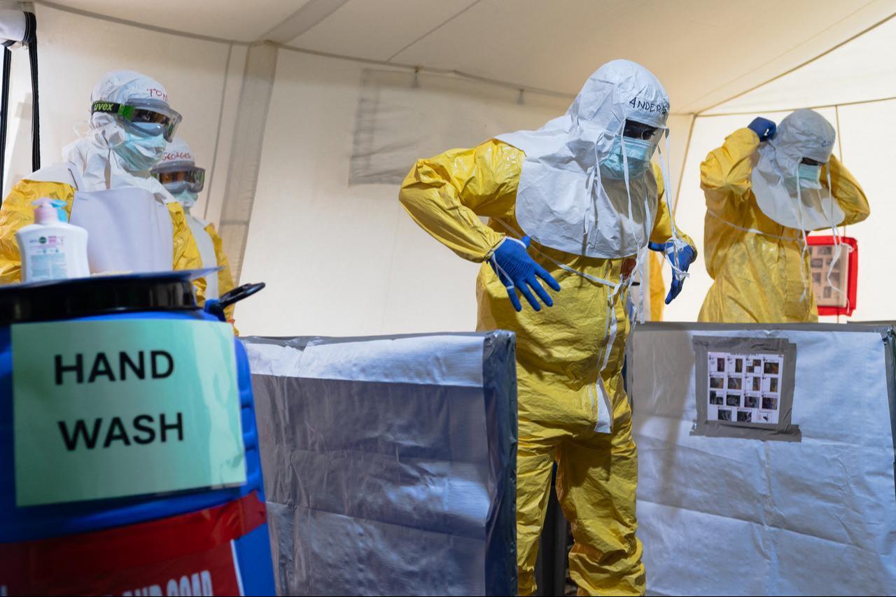 Health workers practice safe removal and disposal of used Personal Protective Equipment (PPE) at the 'Doffing' tent during a training by a medical charity in Kenya, July 10, 2026. (AFP Photo)