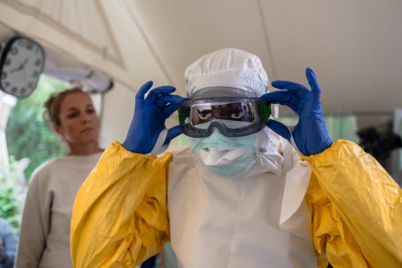 A health worker checks his Personal Protective Equipment (PPE) during a training by a medical charity in Kenya, July 10, 2026. (AFP Photo)
