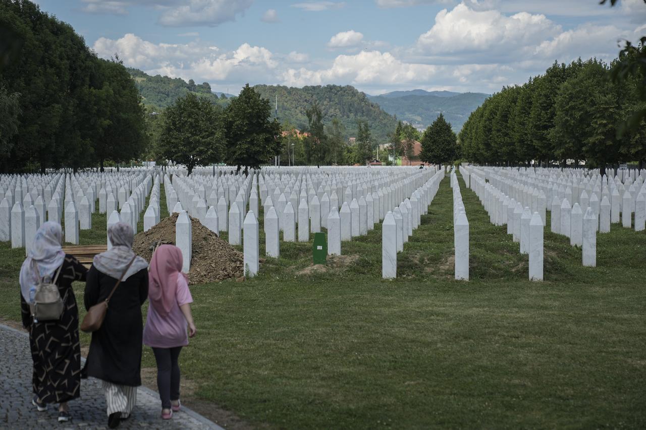 Relatives of victims of the 1995 Srebrenica genocide pray at the graves of their loved ones at the Potocari Memorial Cemetery in Potocari, Bosnia and Herzegovina, July 10, 2026. (AA Photo)