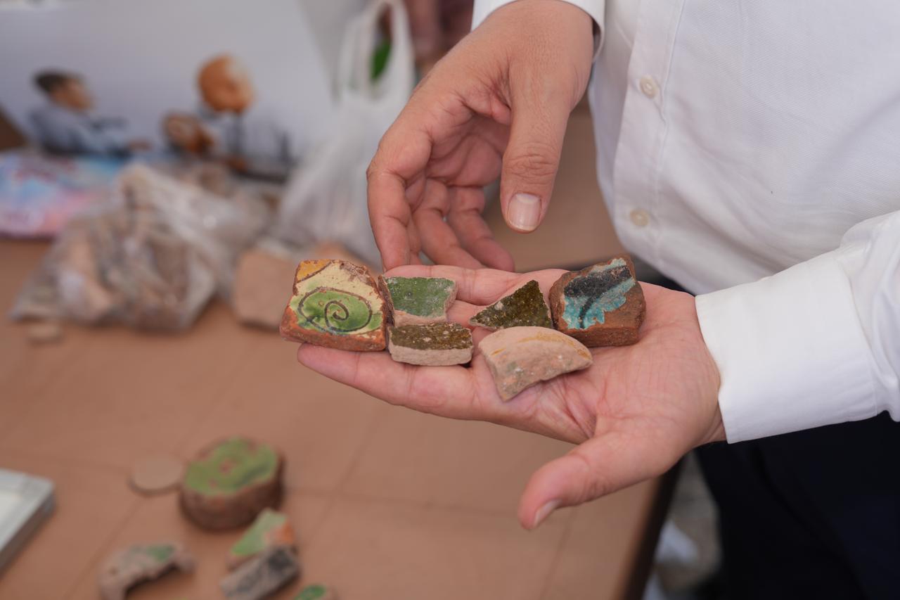 Ceramic fragments from the historic Melikşah Bath excavation are displayed in Çubuk, Ankara, Türkiye, July 11, 2026. (AA Photo)