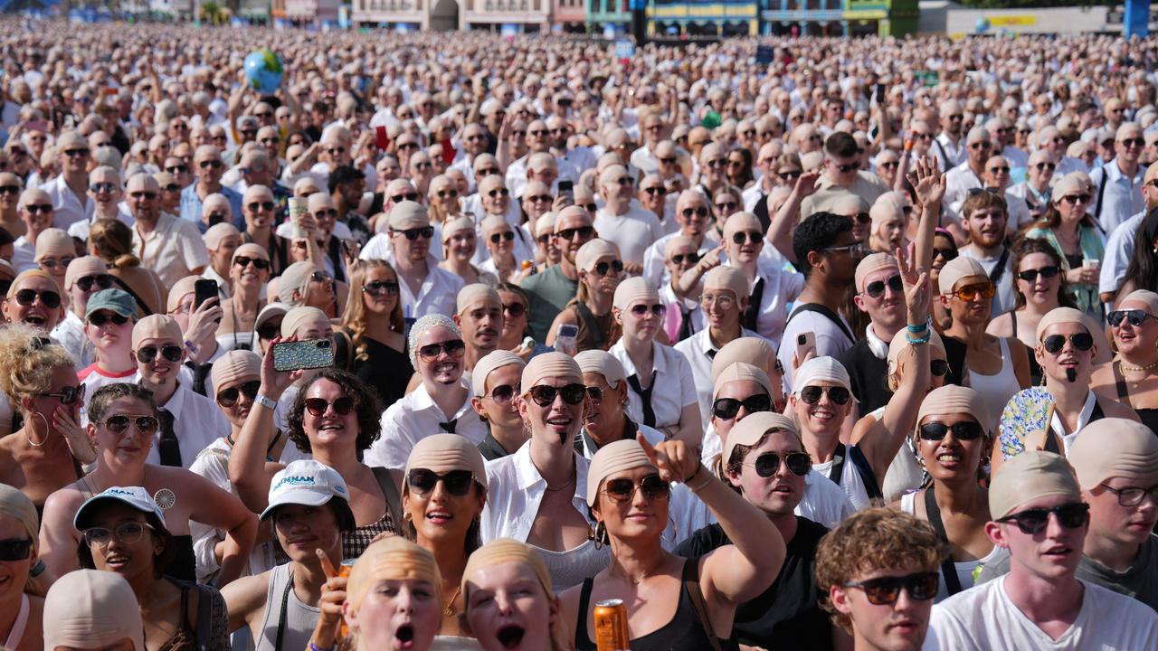 US rapper Pitbull fans set world record for bald caps in London
