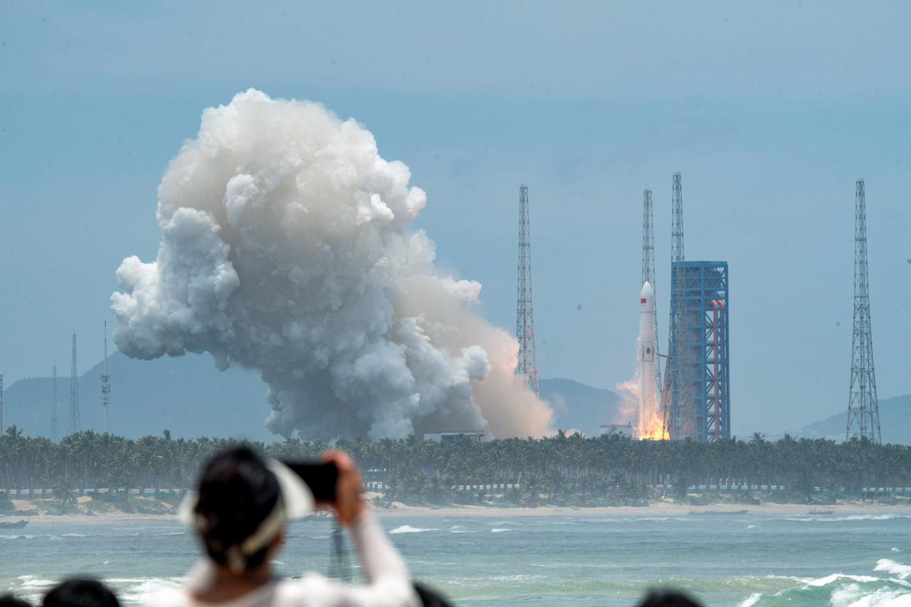 A Long March-10B carrier rocket lifts off from the Hainan Commercial Spacecraft Launch Site in Wenchang in China’s southern Hainan province on July 10, 2026 before the first stage was recovered via a net-based capture system on an offshore recovery platform. (AFP Photo)