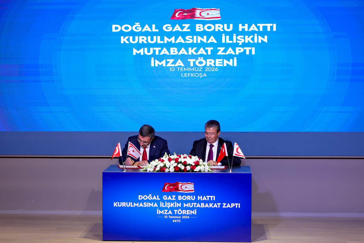 Turkish Vice President Cevdet Yilmaz (L) and TRNC Prime Minister Unal Ustel sign a memorandum of understanding for the construction of the first subsea natural gas pipeline linking Türkiye and Northern Cyprus during a ceremony in Lefkosa, the TRNC, July 10, 2026. (AA Photo)