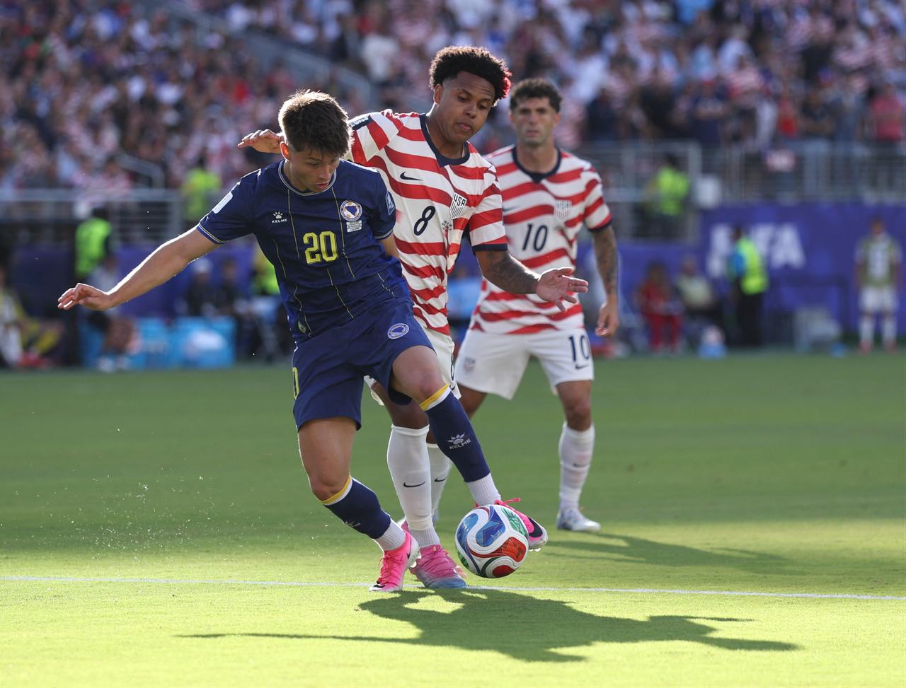 Esmir Bajraktarevic #20 of Bosnia and Herzegovina is challenged by Weston McKennie #8 of the United States during the match between the USA and Bosnia and Herzegovina at San Francisco Bay Area Stadium in California, US, July 01, 2026. (AFP Photo)