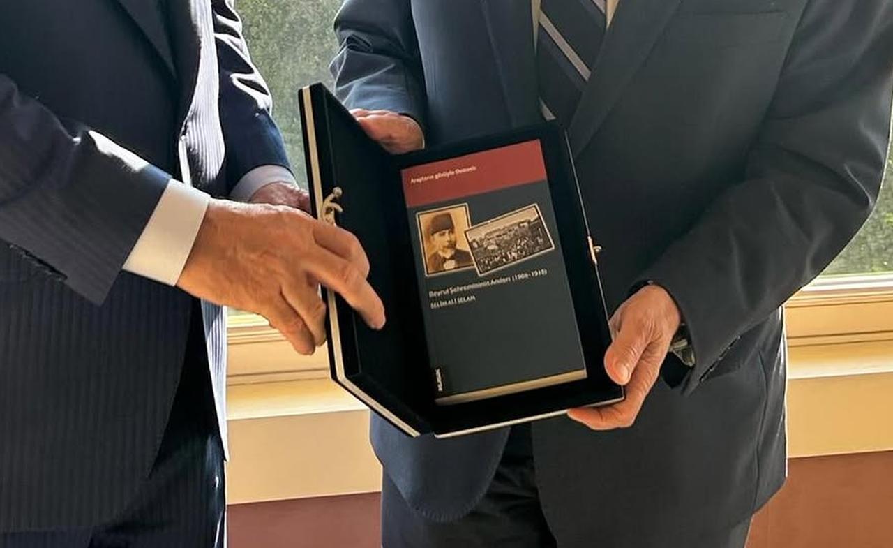 President Recep Tayyip Erdogan presents Lebanese Prime Minister Nawaf Salam with the Turkish translation of his grandfather Selim Ali Salam’s Ottoman-era memoirs during their meeting at Vahdettin Kosku in Istanbul, Türkiye. (Photo via Instagram/@nawafasalam)