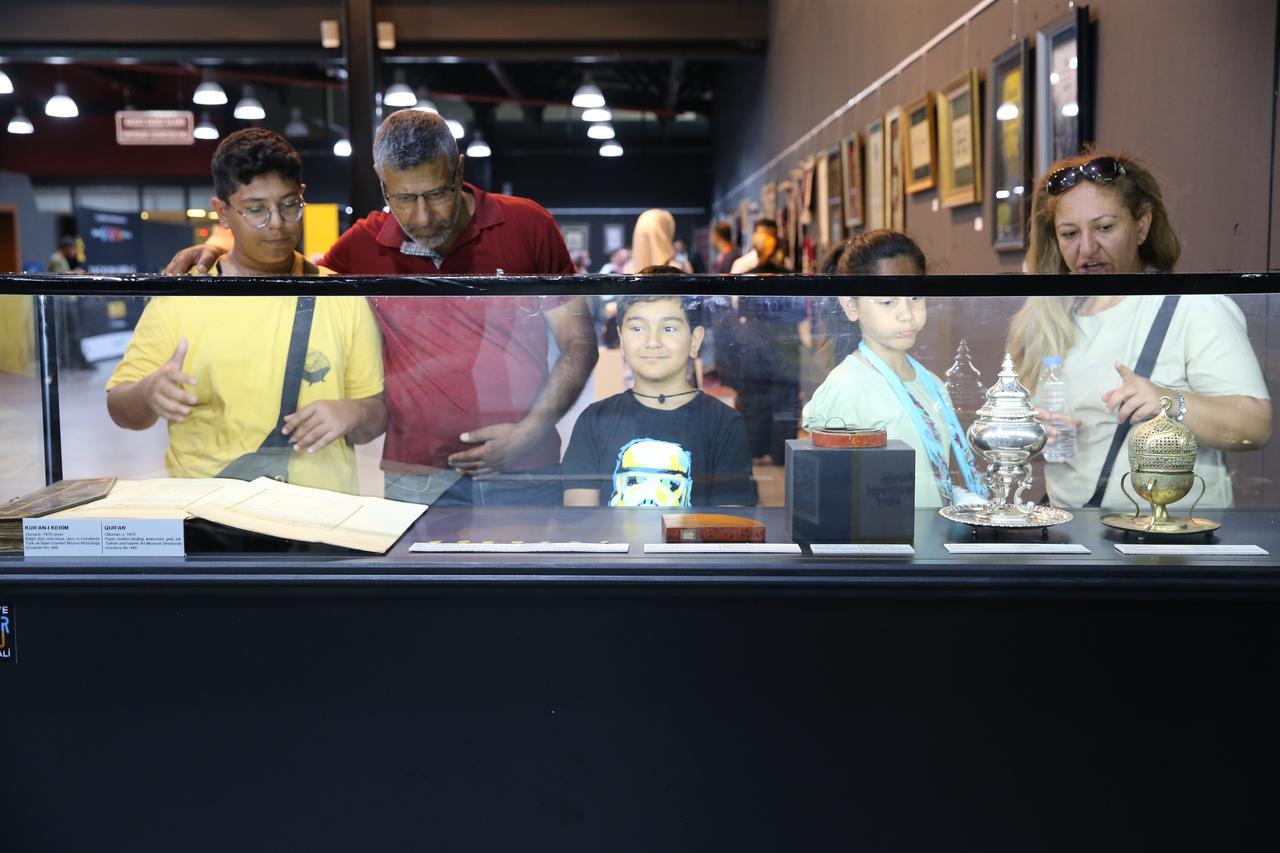 Visitors examine artifacts displayed at Van Museum during the opening of the Türkiye Culture Route Festival in Van, eastern Türkiye. (AA Photo)