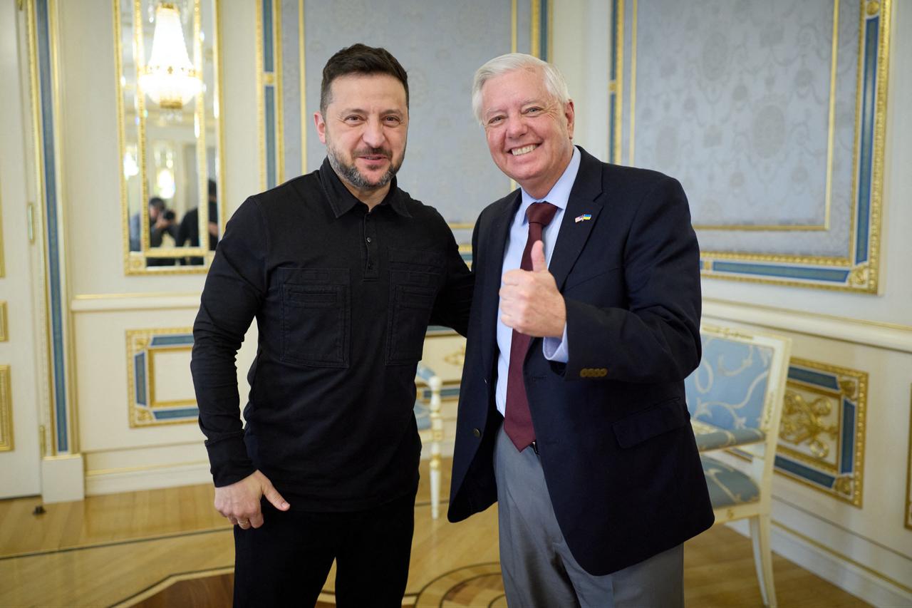 This handout photograph taken and released by the Ukrainian Presidential Press Service on July 10, 2026, shows Ukrainian's President Volodymyr Zelensky (L) and US Senator Lindsey Graham (R) meeting in Kyiv, amid the Russian invasion in Ukraine. (Photo by Ukrainian Presidential Press Service / HO / AFP)