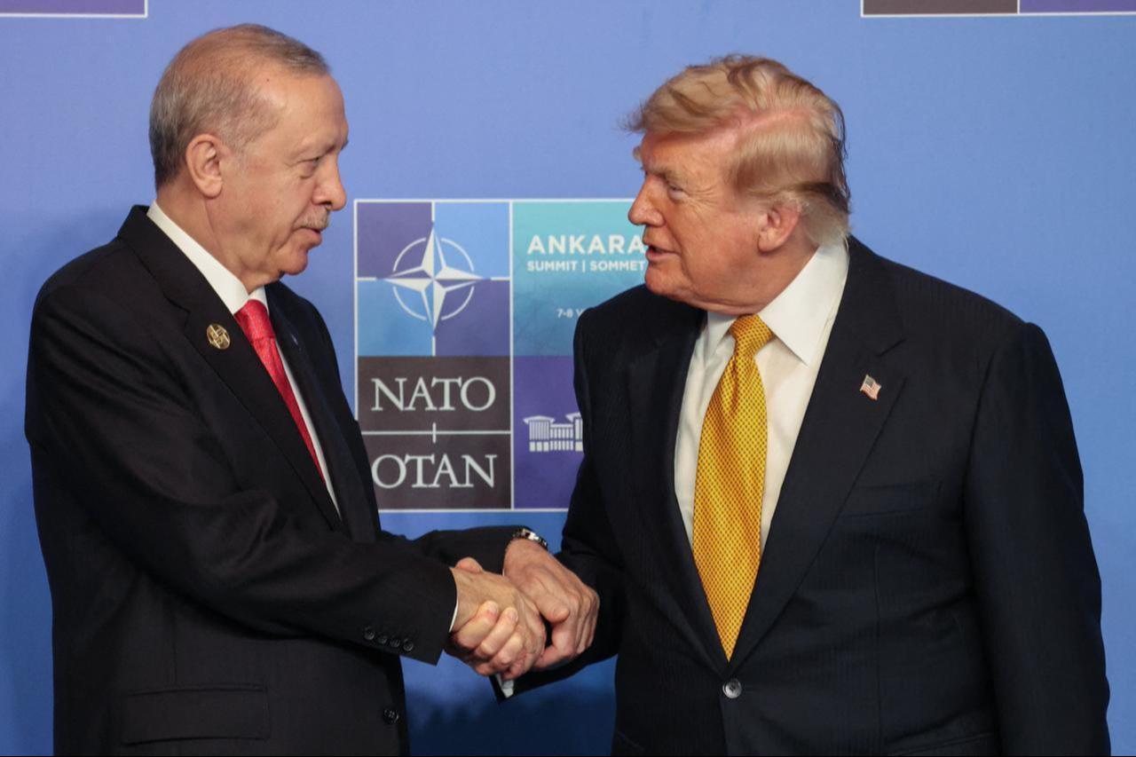 President Recep Tayyip Erdogan and US President Donald Trump shake hands as they join NATO leaders for a family photo during the NATO Summit at Bestepe Presidential Compound in Ankara, Türkiye, July 8, 2026. (AFP Photo)