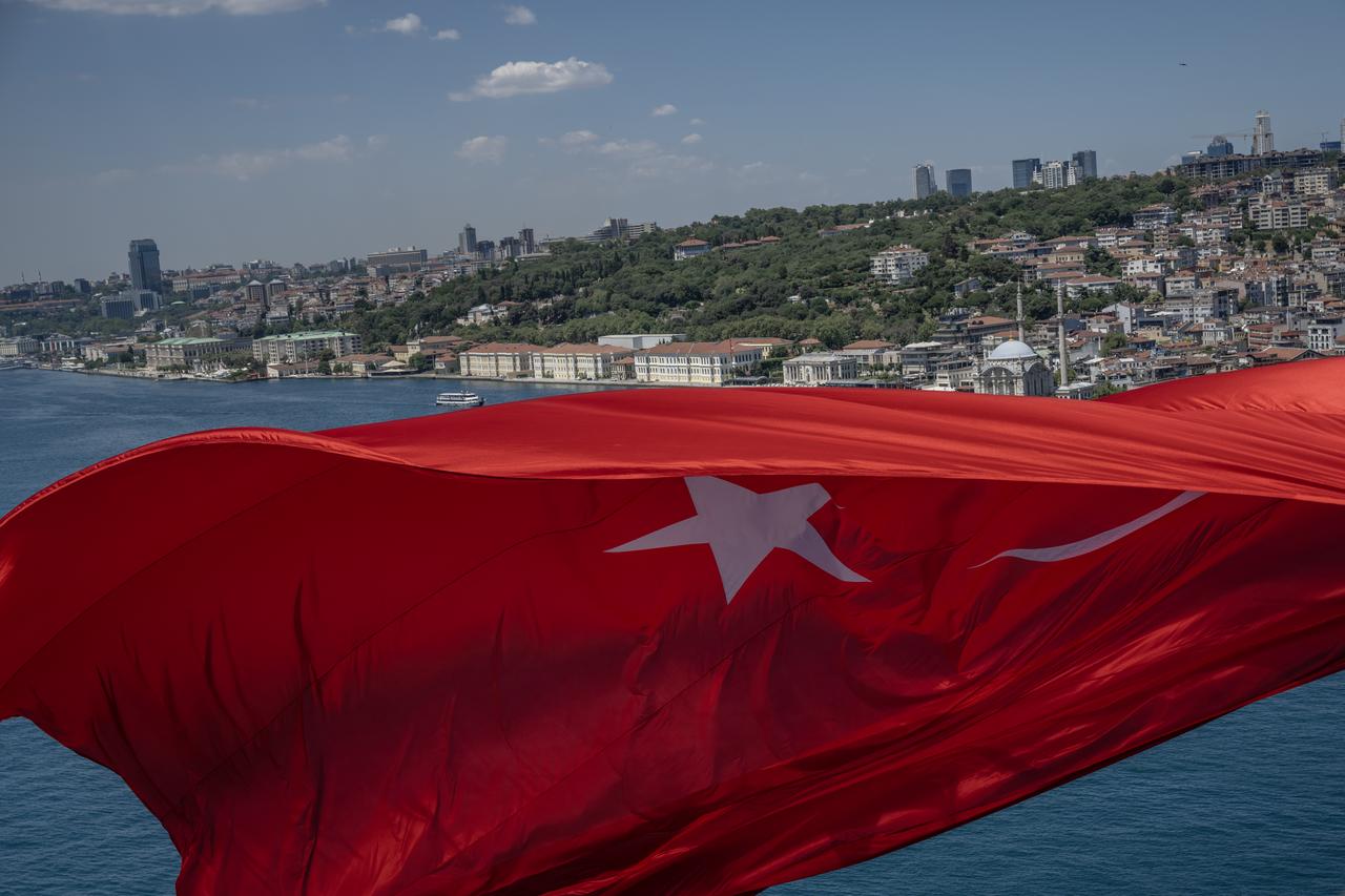A giant Turkish flag is hung from the July 15 Martyrs Bridge in Istanbul, Türkiye, on July 11, 2026, ahead of the 10th anniversary of the July 15, 2016 defeated coup attempt. (AA Photo)