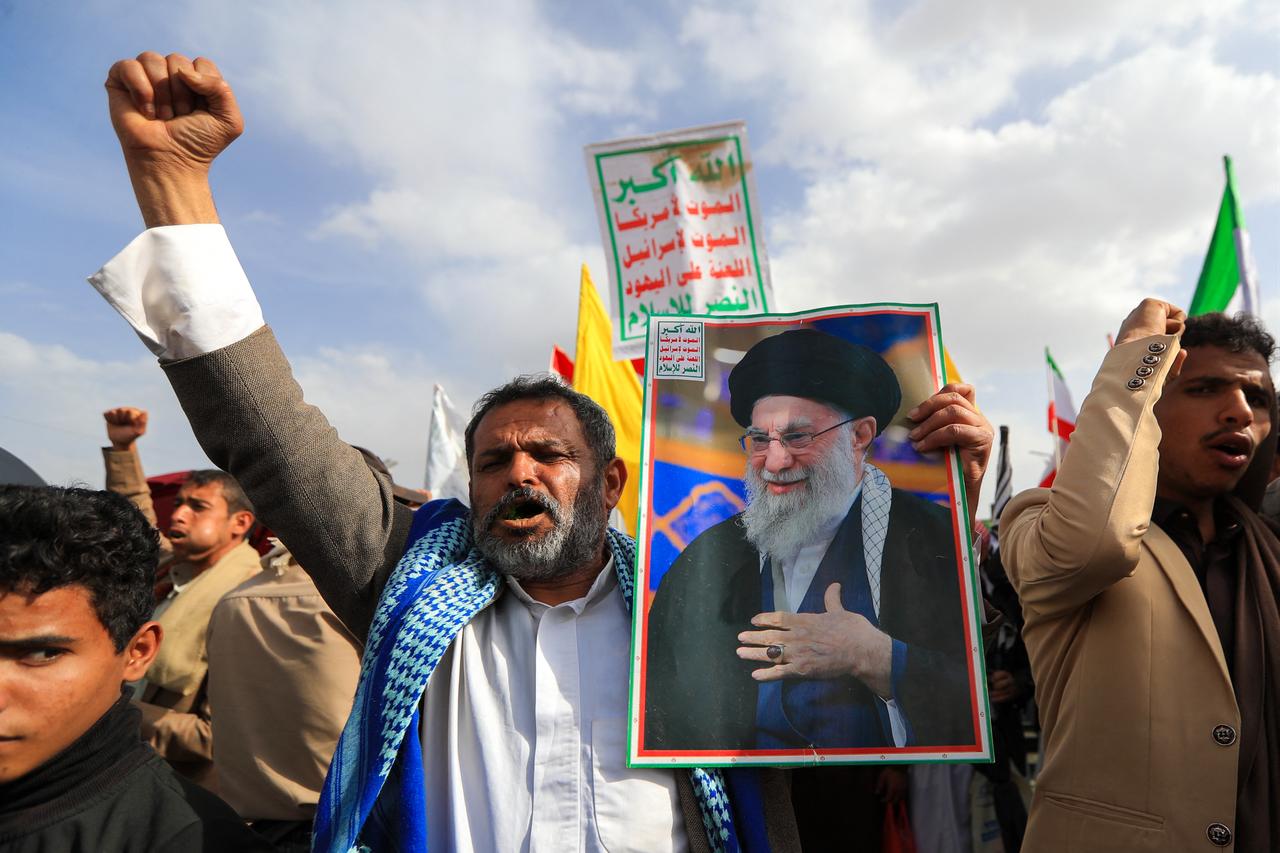 A Yemeni supporter of the Iran-backed Houthi movement holds a portrait of Iran's slain supreme leader Ali Khamenei during a protest against US strikes on Iran in Sanaa, July 10, 2026. (AFP Photo)