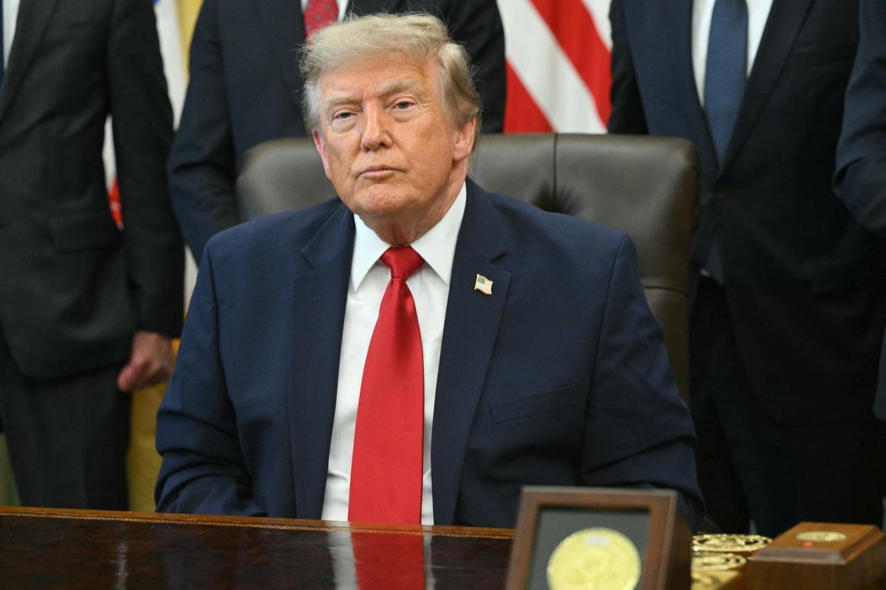 US President Donald Trump looks on after signing an executive order at the Oval Office of the White House in Washington, DC, July 13, 2026. (AFP Photo)