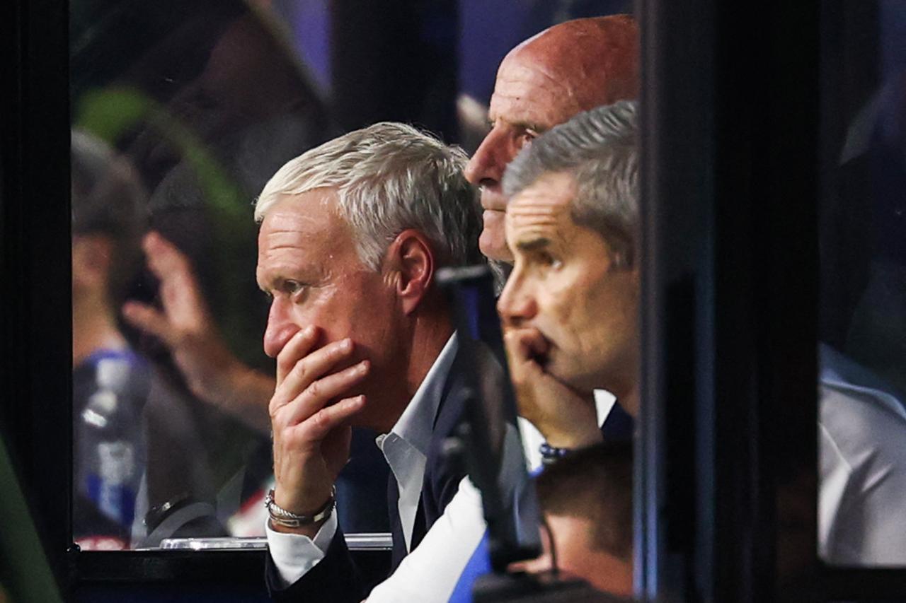 France's head coach Didier Deschamps reacts on the bench during the 2026 World Cup football tournament semi-final match between France and Spain.  (AFP Photo)