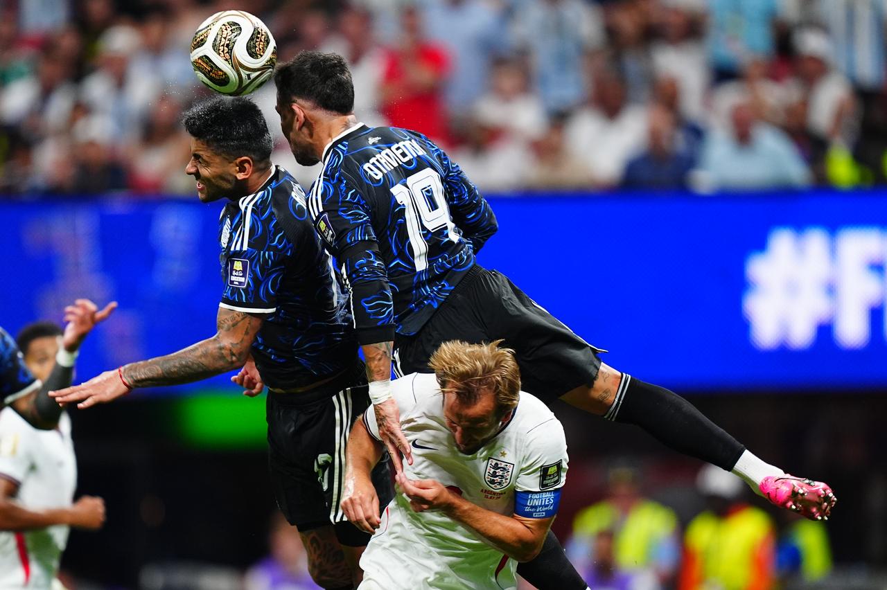 Otamendi of Argentina and Harry Kane of England compete during the 2026 FIFA World Cup semifinal match between England and Argentina at Atlanta Stadium in Atlanta, Georgia, United States, July 15, 2026. (AA Photo)