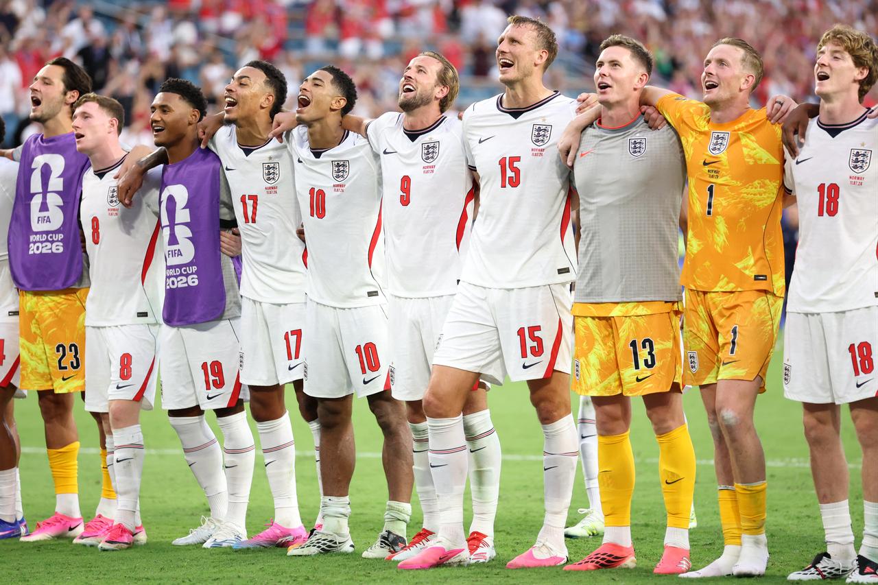 Jude Bellingham, Harry Kane and Dan Burn #15 of England sing to the fans the FIFA World Cup 2026 Quarter Final match between Norway and England at Miami Stadium in Florida, US, July 11, 2026, (AFP Photo)