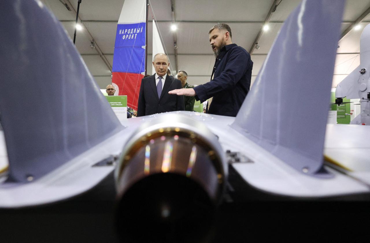 Russia's President Vladimir Putin tours an exhibition of the Everything for the Victory patriotic forum in Moscow on July 13, 2026. (AFP Photo)