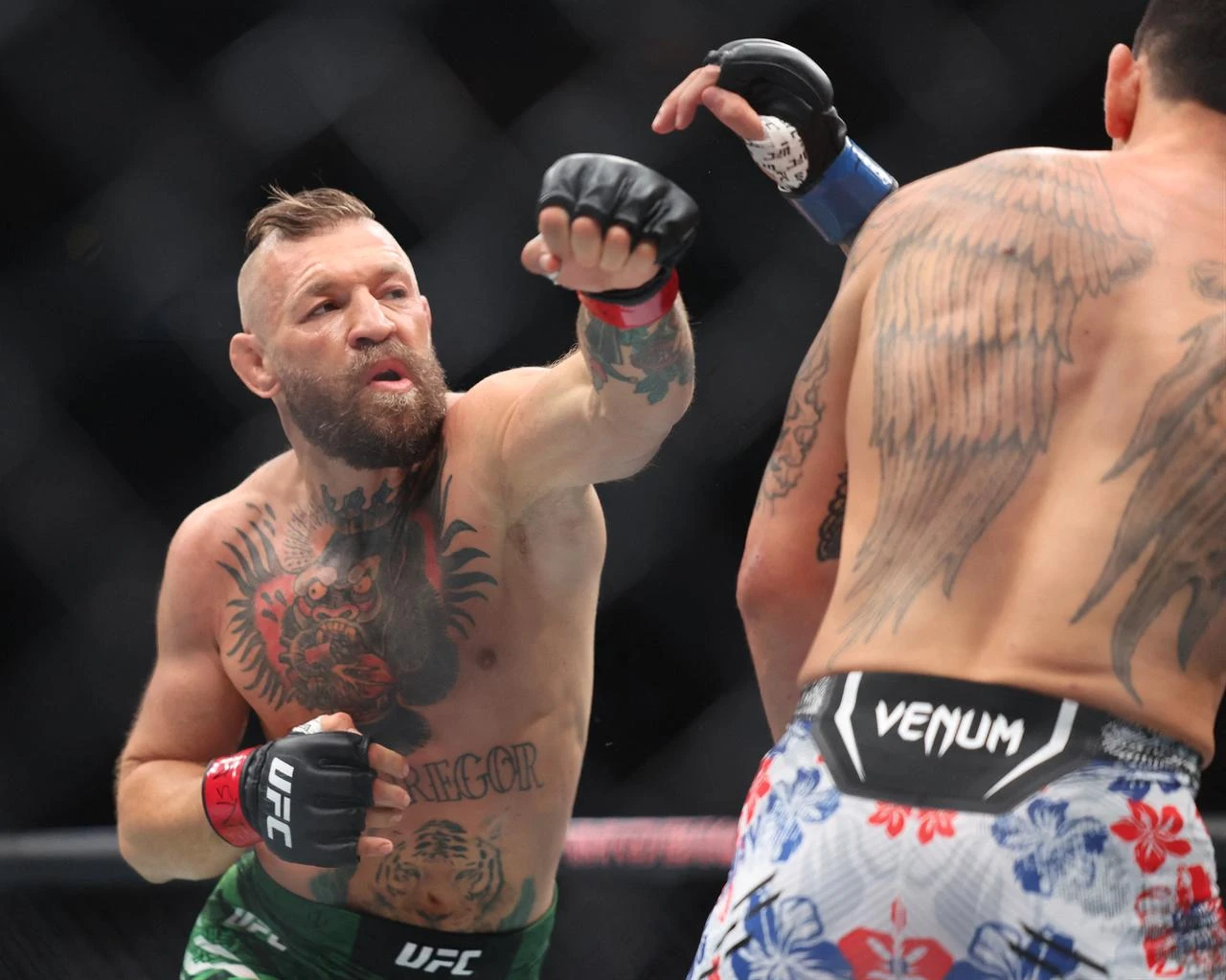 Conor McGregor of Ireland throws a punch in the first round against Max Holloway of the United States in their welterweight bout during UFC 329 at T-Mobile Arena, in Las Vegas, Nevada, July 11, 2026. (AFP Photo)