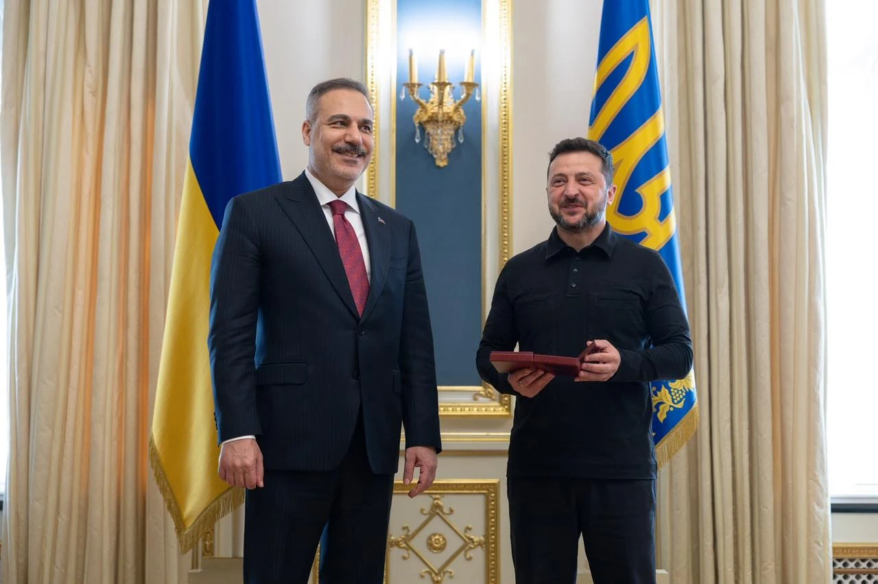 Ukrainian President Volodymyr Zelenskyy (R) presents Turkish Foreign Minister Hakan Fidan (L) with Ukraine's Second Class Order of Merit in recognition of his personal contribution to strengthening interstate cooperation and bilateral relations in Kyiv, Ukraine, on July 16, 2026. (AA Photo)
