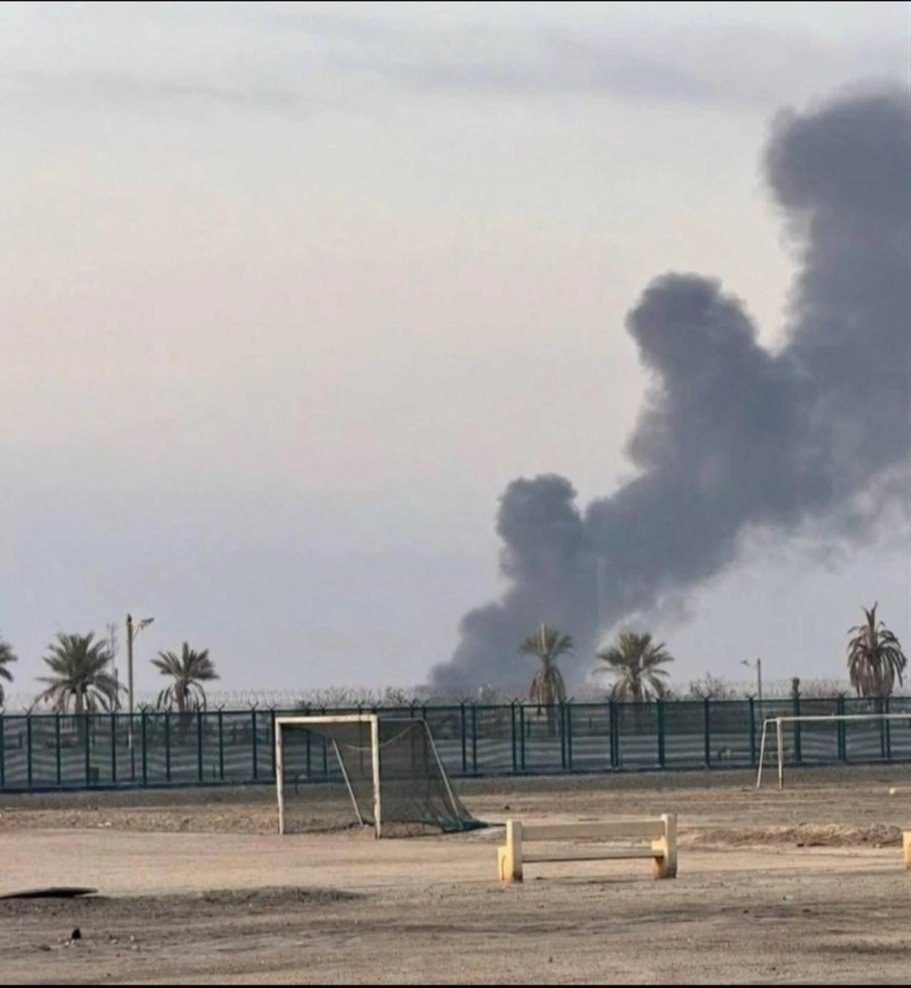 The photo reportedly shows a plume of smoke seen from the BAPCO BAPCO refinery in Bahrain after Iranian drone strikes. (Photo via Telegram)