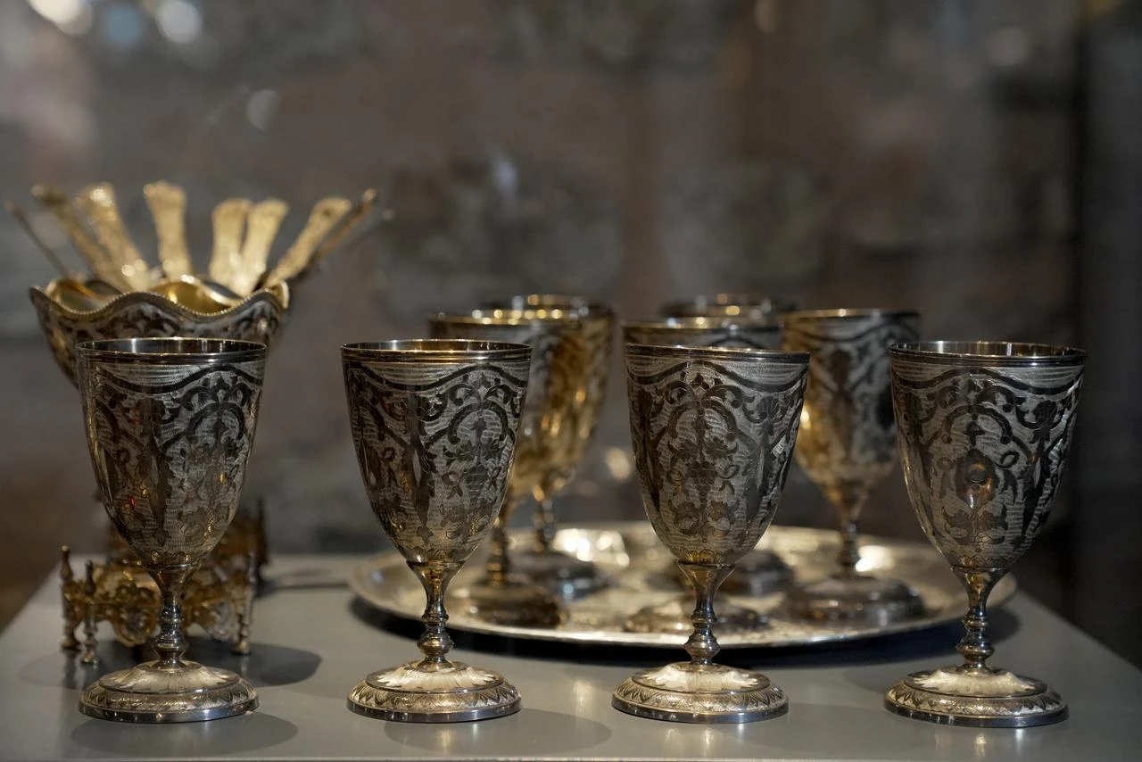Engraved silver sherbet goblets are displayed in the restored Şerbethane section of Topkapı Palace in Istanbul, Türkiye, July 17, 2026. (AA Photo)