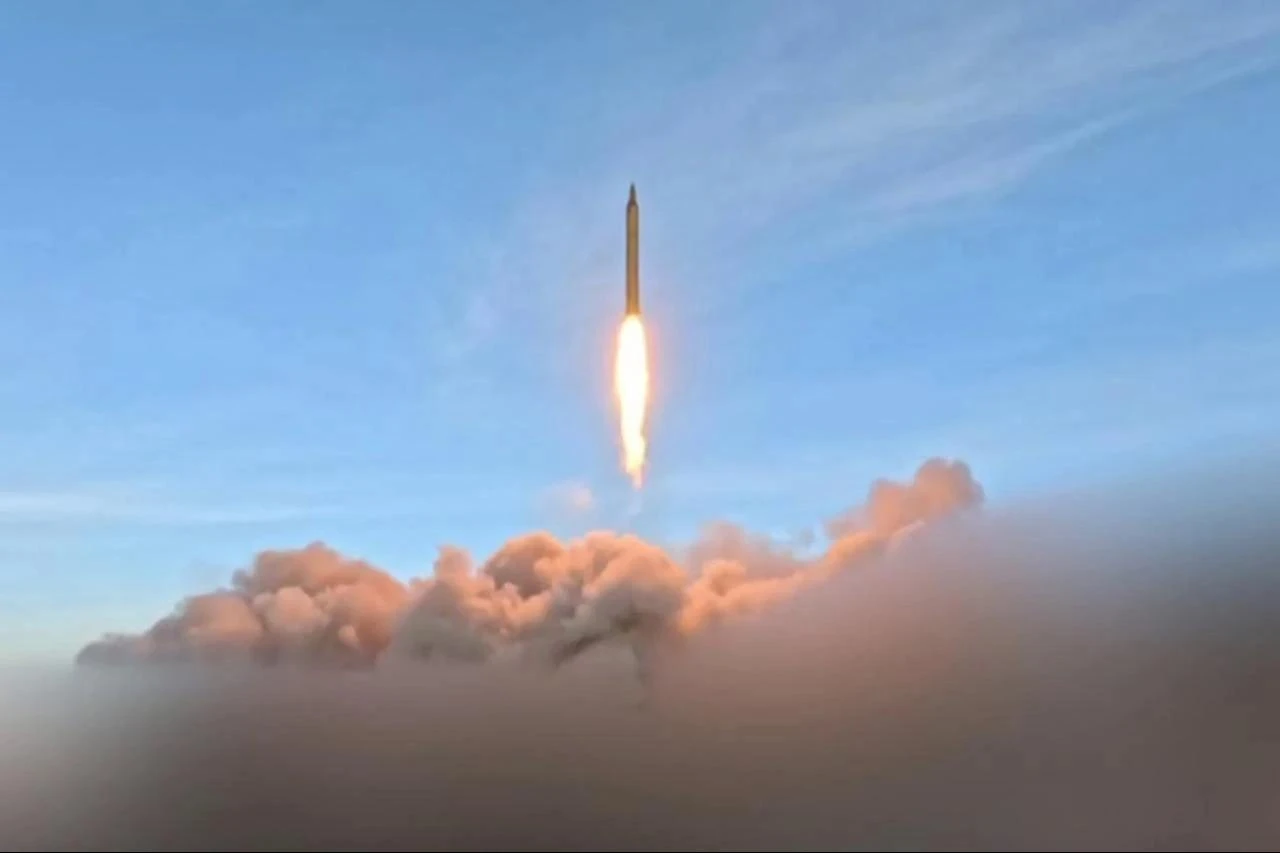 This video grab taken from handout footage released by the Iranian Revolutionary Guard Corps (IRGC) on March 12, 2026, shows an Iranian missile. (Photo by Iran's Islamic Revolutionary Guard Corps (IRGC)/HO/AFP)