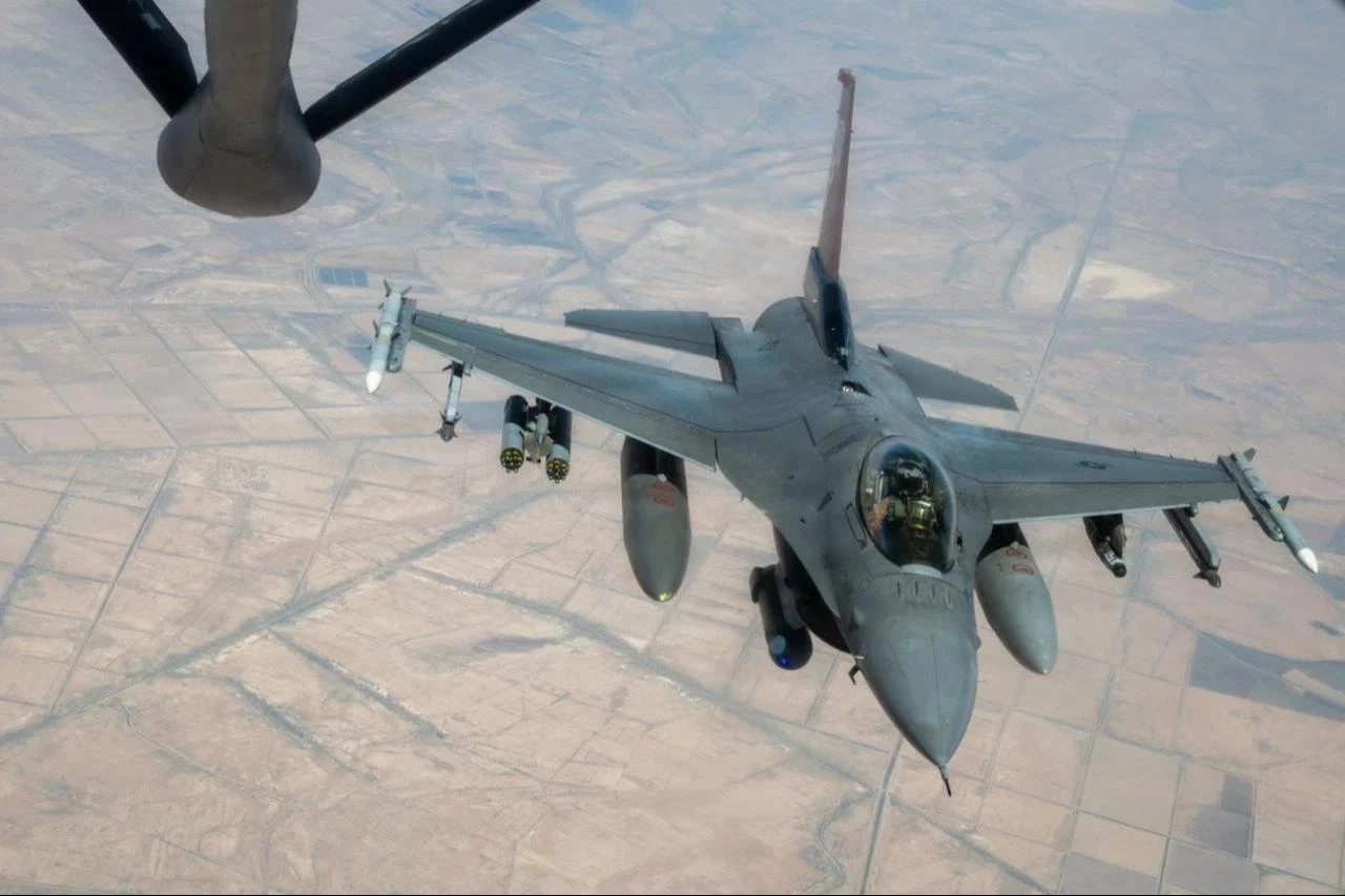 An F-16 fighter jet flies over the Middle East during an aerial refueling operation, June 25, 2026. (Photo via X/@CENTCOM)