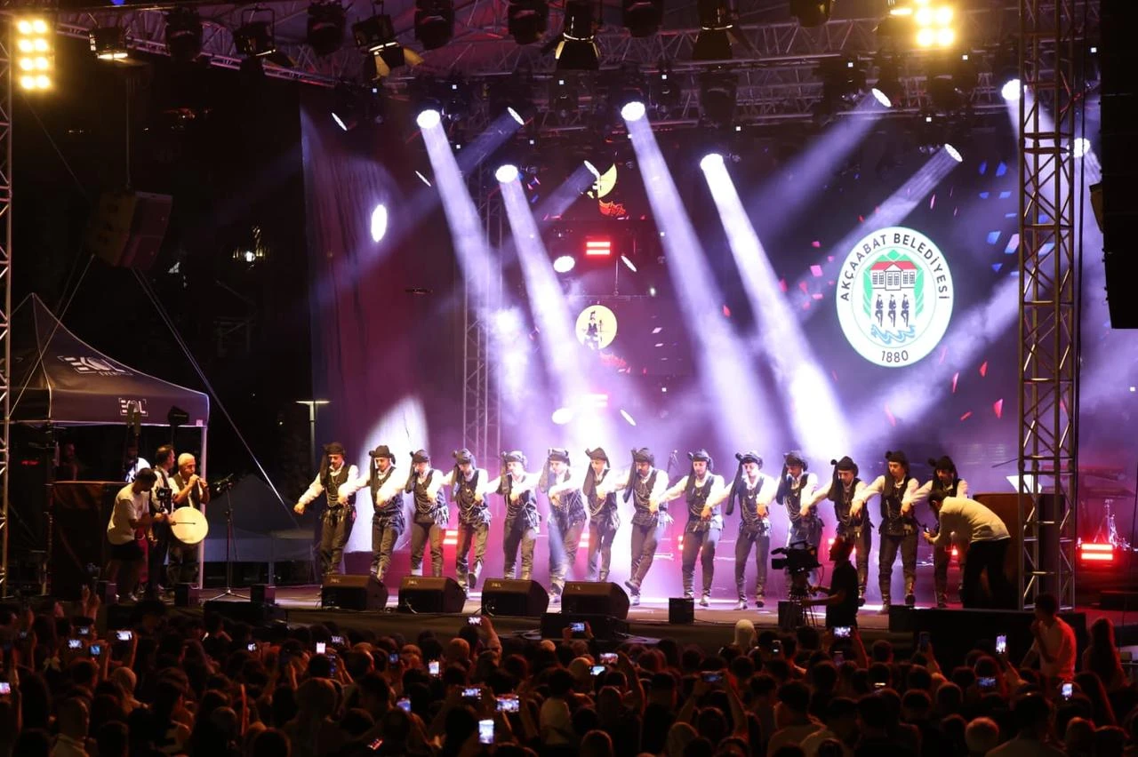 Male dancers perform onstage during the 34th International Akçaabat Music and Folk Dance Festival in Akçaabat, Trabzon, Türkiye, July 17, 2026. (AA Photo)