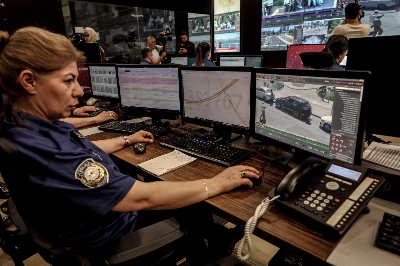 Turkish police officers watch live CCTV images of the streets of Ankara from a monitoring centre as part of NATO security preparations, in Ankara on July 1, 2026. (AFP Photo)