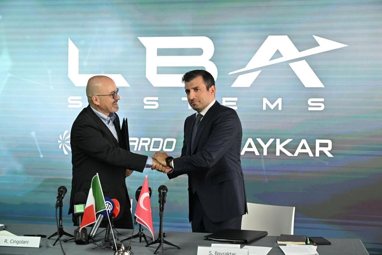 Baykar chairman Selcuk Bayraktar (R) and Leonardo CEO Roberto Cingolani (L) attend the signing ceremony of the joint venture between Baykar Technologies and Leonardo in Paris, France, June 16, 2025. (AA Photo)