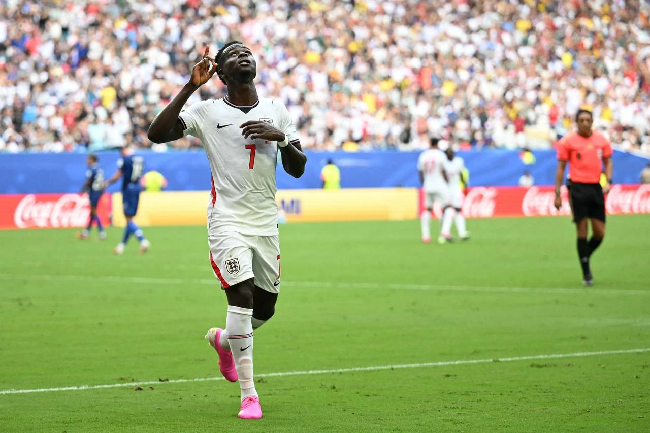 England's forward #07 Bukayo Saka celebrates scoring his team's fourth goal during the 2026 World Cup football match between France and England at the Miami Stadium in Miami, U.S, July 18, 2026. (AFP Photo)