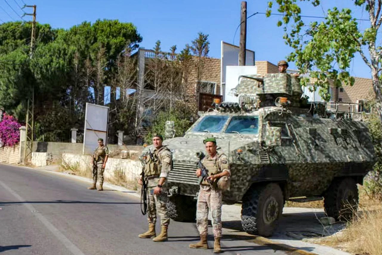 This handout photograph released by the Lebanese army press office on July 15, 2026 shows Lebanese army soldiers setting up a checkpoint at a position in southern Lebanon. (Photo by Lebanese Army Press Office/HO/AFP)