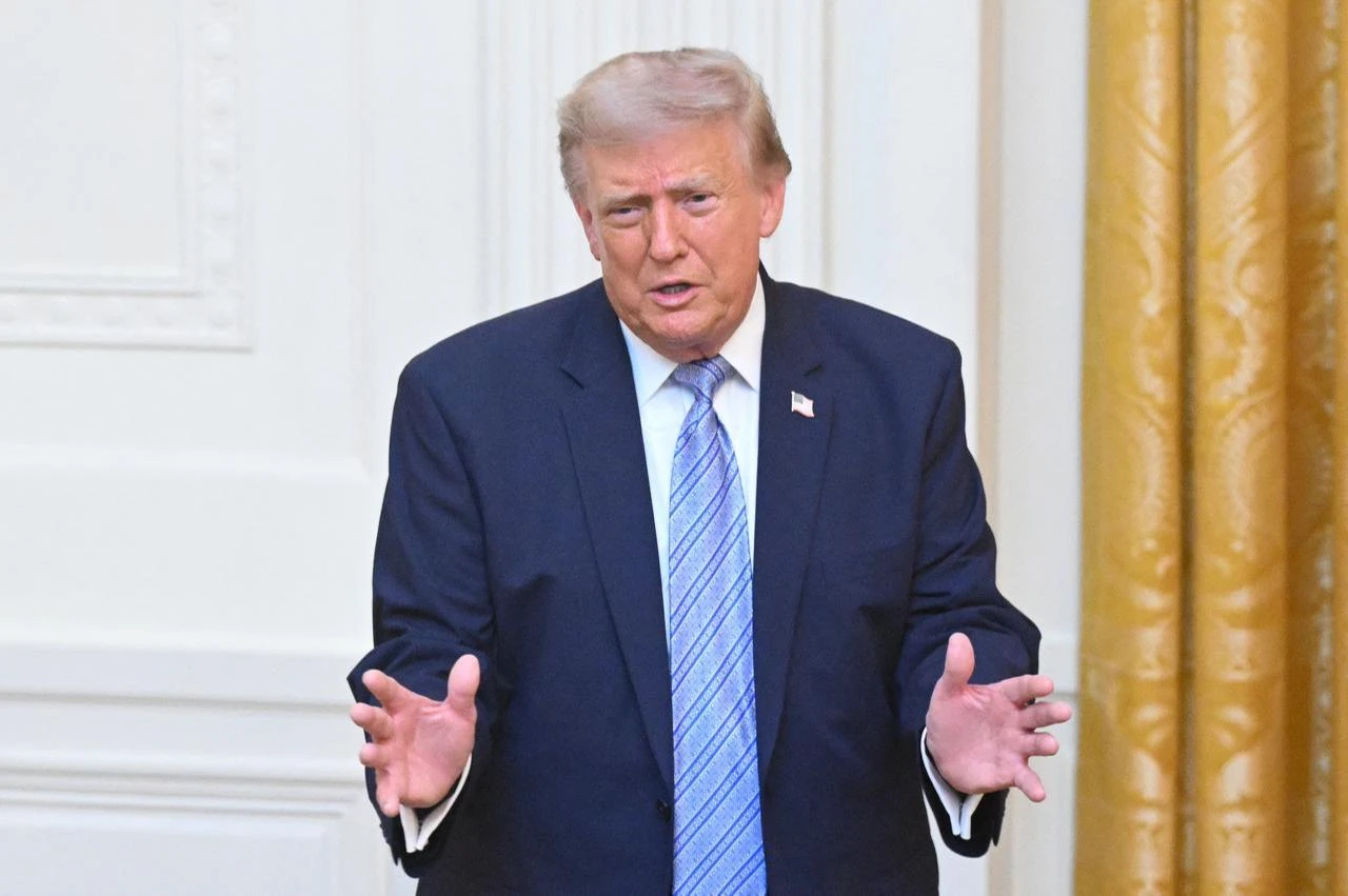 US President Donald Trump gestures after delivering an address to the nation from the East Room of the White House in Washington, DC, July 16, 2026. (AFP Photo)