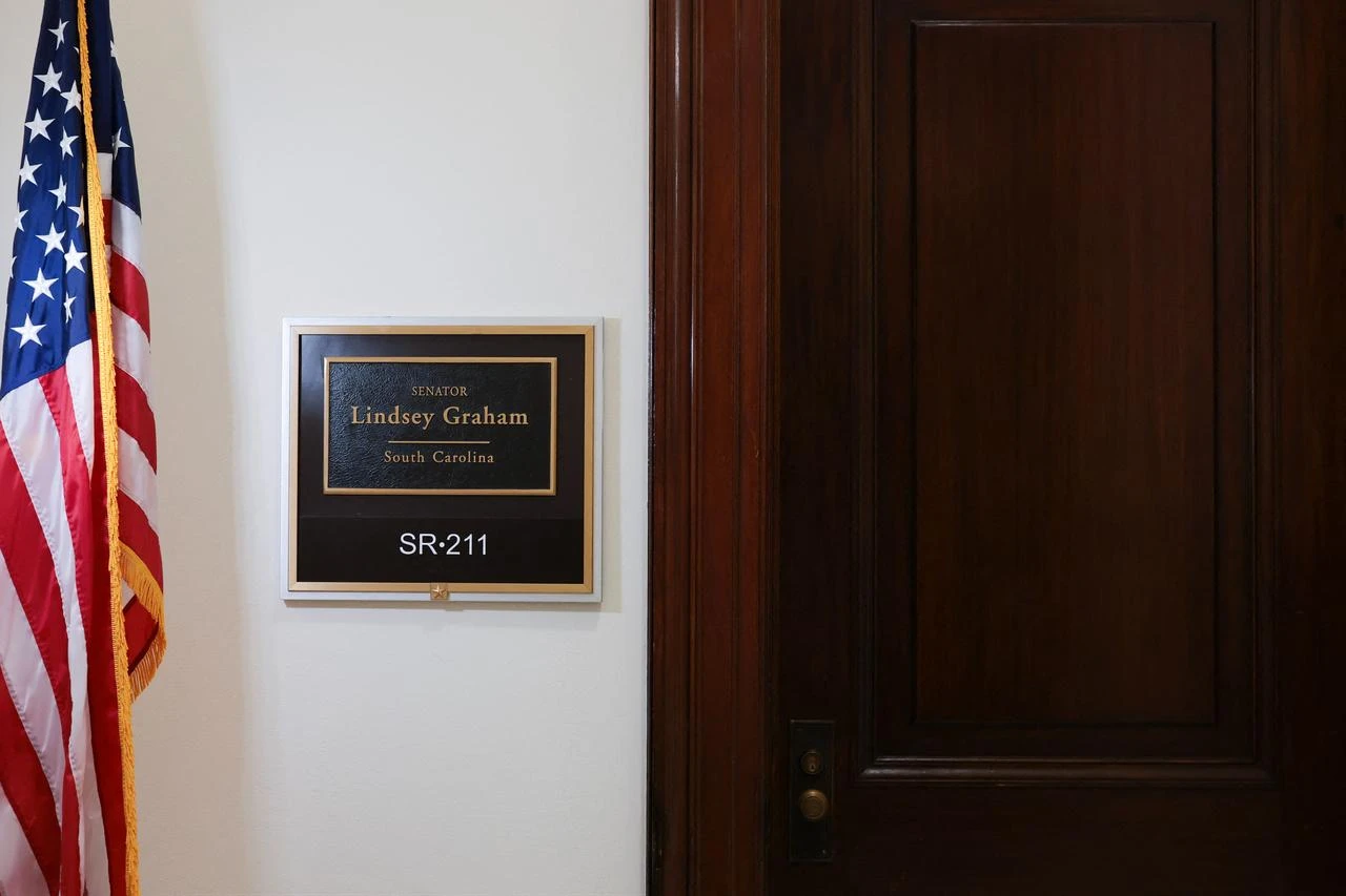 A name placard for U.S. Sen. Lindsey Graham (R-SC) is seen outside his office in the Russell Senate Office Building on July 13, 2026 in Washington, DC. (AFP Photo)