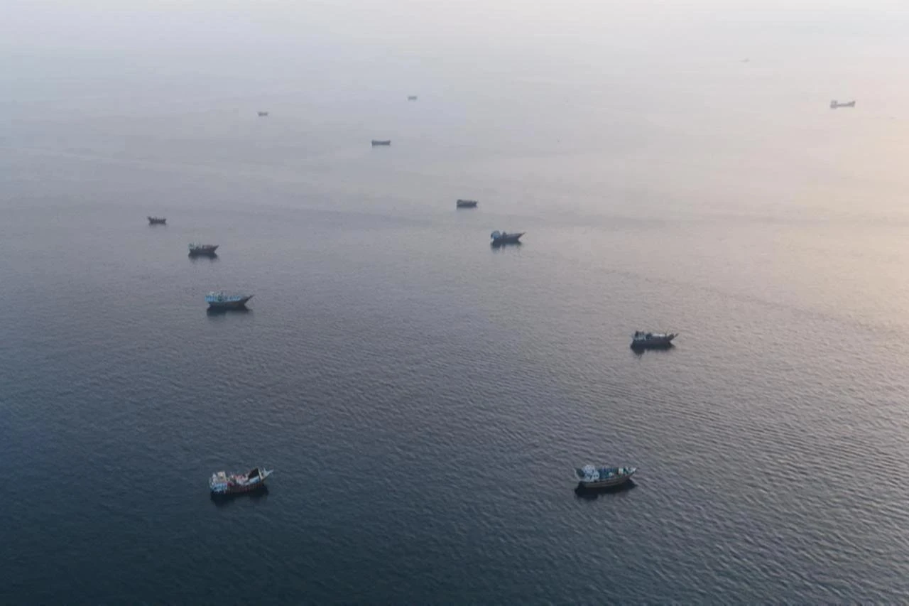 This aerial photograph shows boats anchored off Oman’s northern Musandam Peninsula near the Strait of Hormuz, June 27, 2026. (AFP Photo)