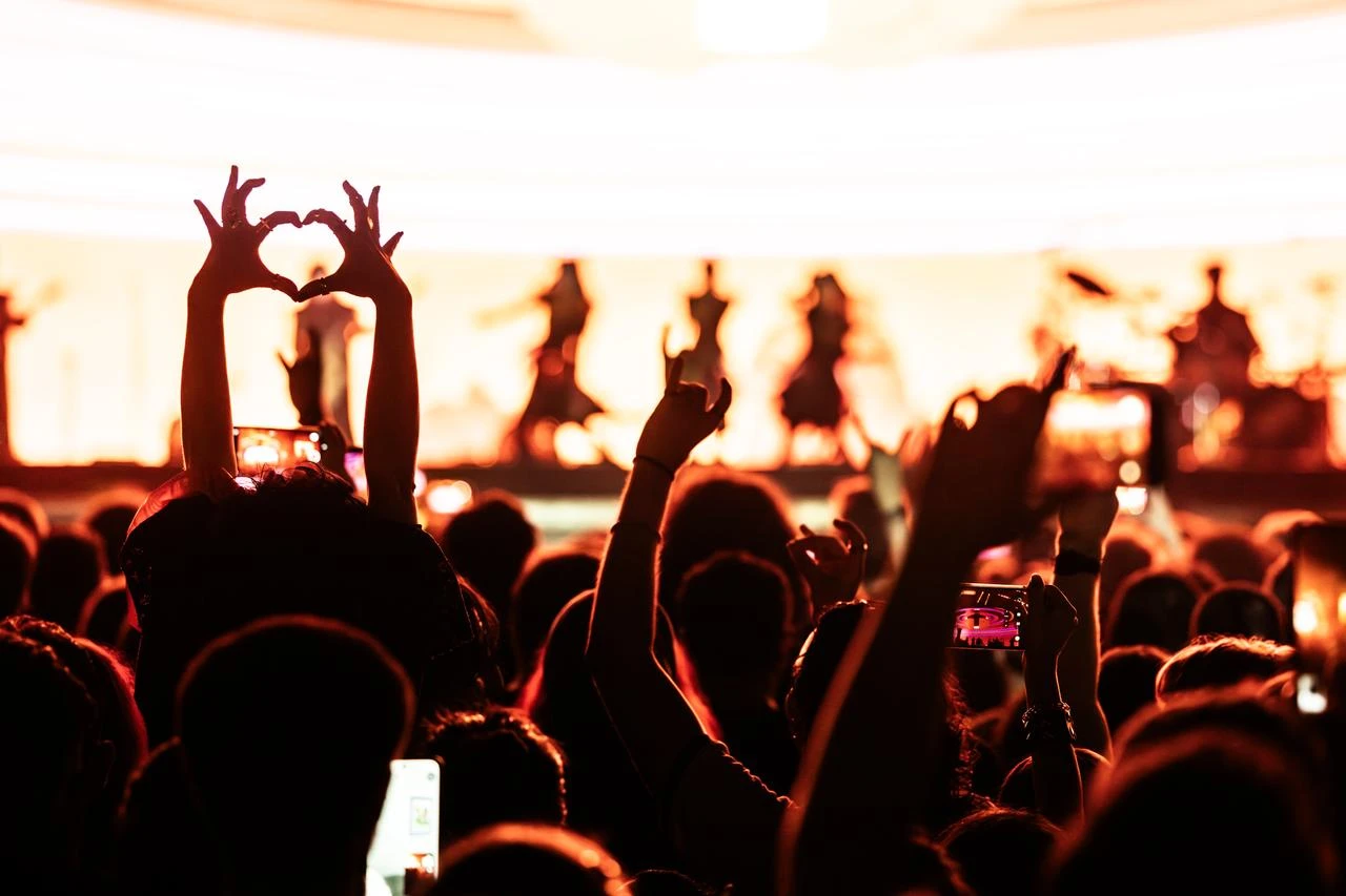 Fans raise their hands as Japanese metal group Babymetal performs in Istanbul for the first time during a stop on its world tour. (AA Photo)