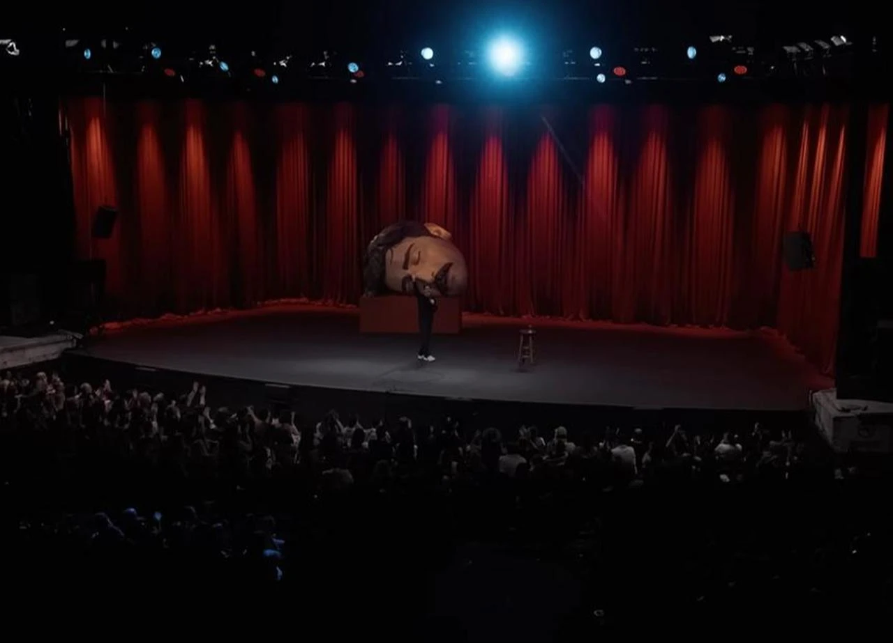 Deniz Goktas performs during his stand-up show “Dead Deniz” in a 2026 YouTube screenshot. (Photo via YouTube)