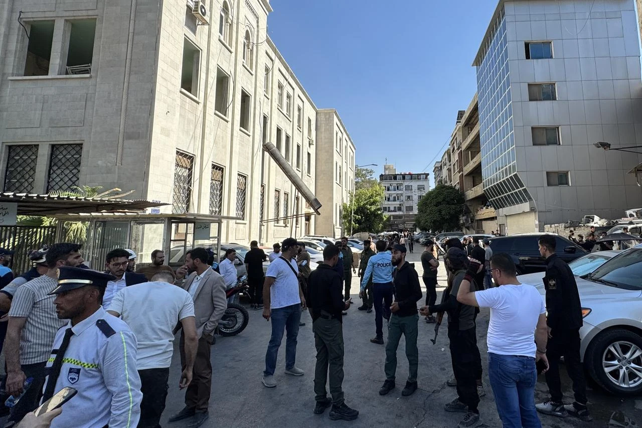 Medics and security forces are deployed to the scene after a powerful explosion occurred at a cafe on the road leading to the historic Hamidiyeh Souq, one of the busiest spots in the Syrian capital of Damascus, on July 2, 2026. (AFP Photo)