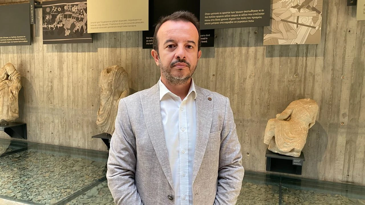 Ridvan Golcuk poses inside the Troy Museum in Canakkale, Türkiye, Aug. 26, 2024. (IHA Photo)