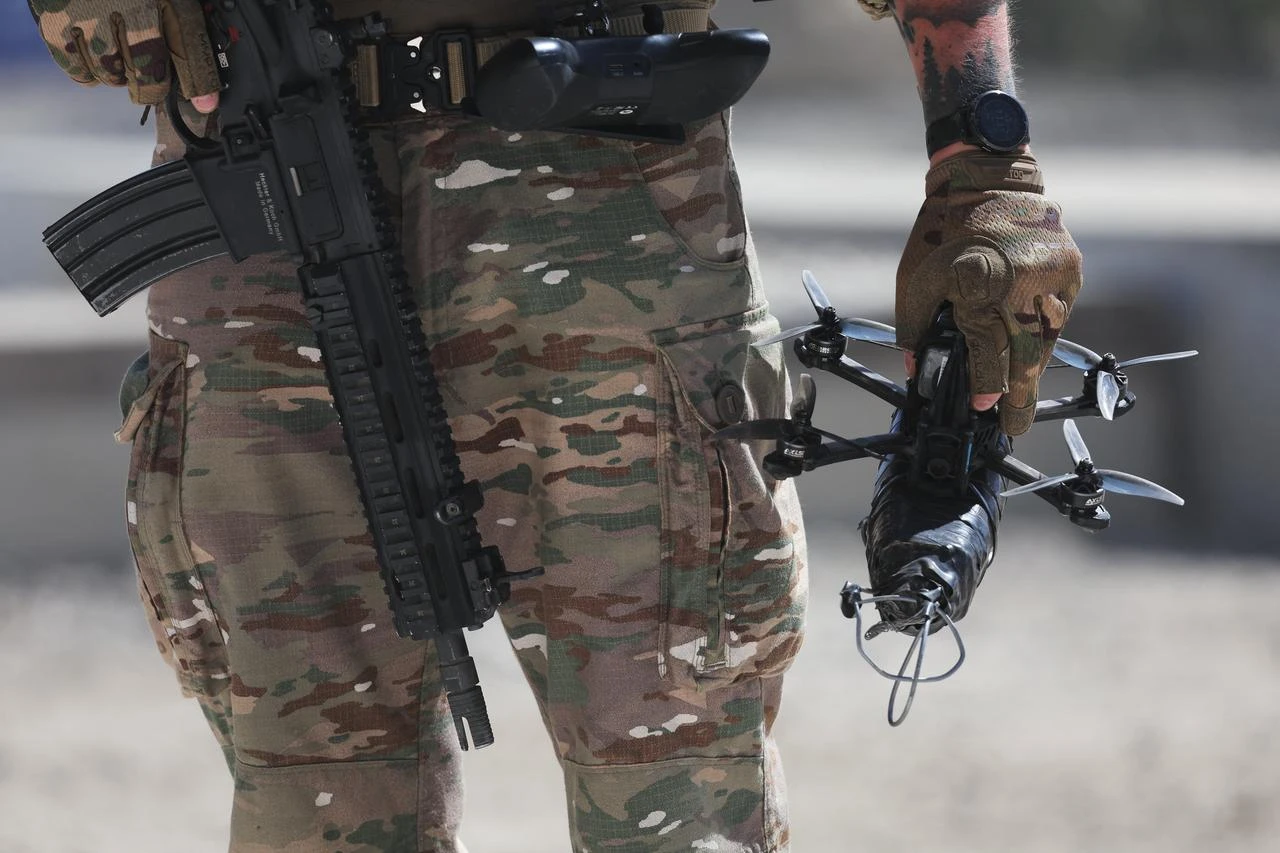 A soldier of the French Army holds an FPV drone during a dynamic demonstration of military equipment at the Eurosatory defense and security trade show in Villepinte, June 14, 2026. (AFP Photo)