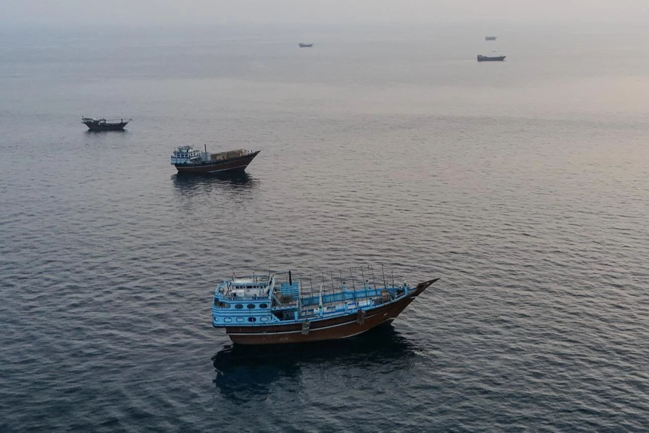 This aerial photograph shows boats anchored off Oman’s northern Musandam Peninsula near the Strait of Hormuz on June 27, 2026. (AFP Photo)