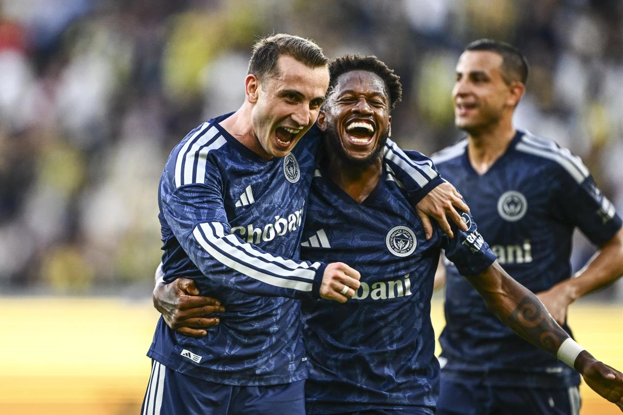 Fenerbahce’s Kerem Akturkoglu celebrates after scoring a goal during a friendly match against LASK Linz as part of Fenerbahce’s pre-season training camp at Raiffeisen Arena in Linz, Austria, July 14, 2026. (AA Photo)