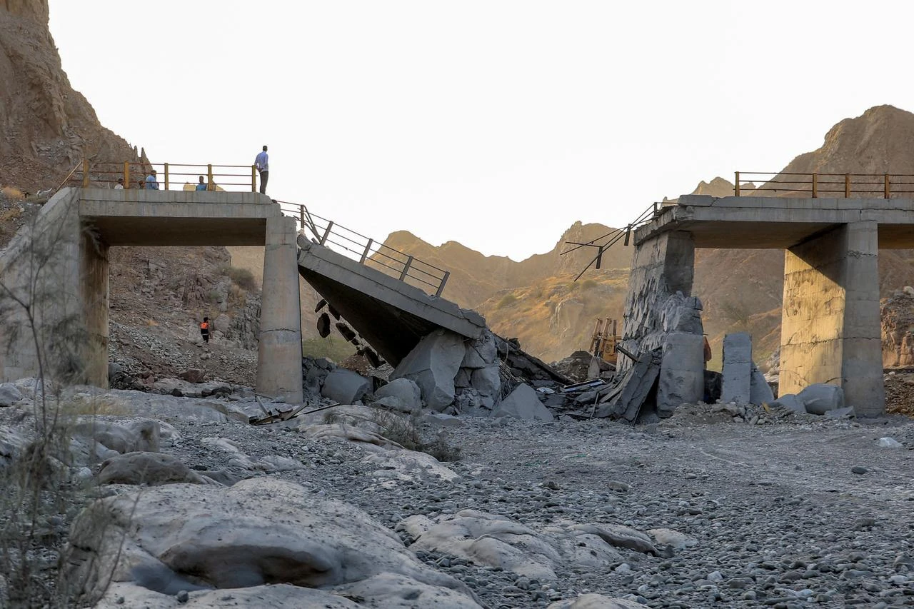 A heavily-damaged bridge which was hit by a US strike is pictured along the road connecting Roudan and Bandar Abbas in southern Iran on July 18, 2026. (AFP Photo)
