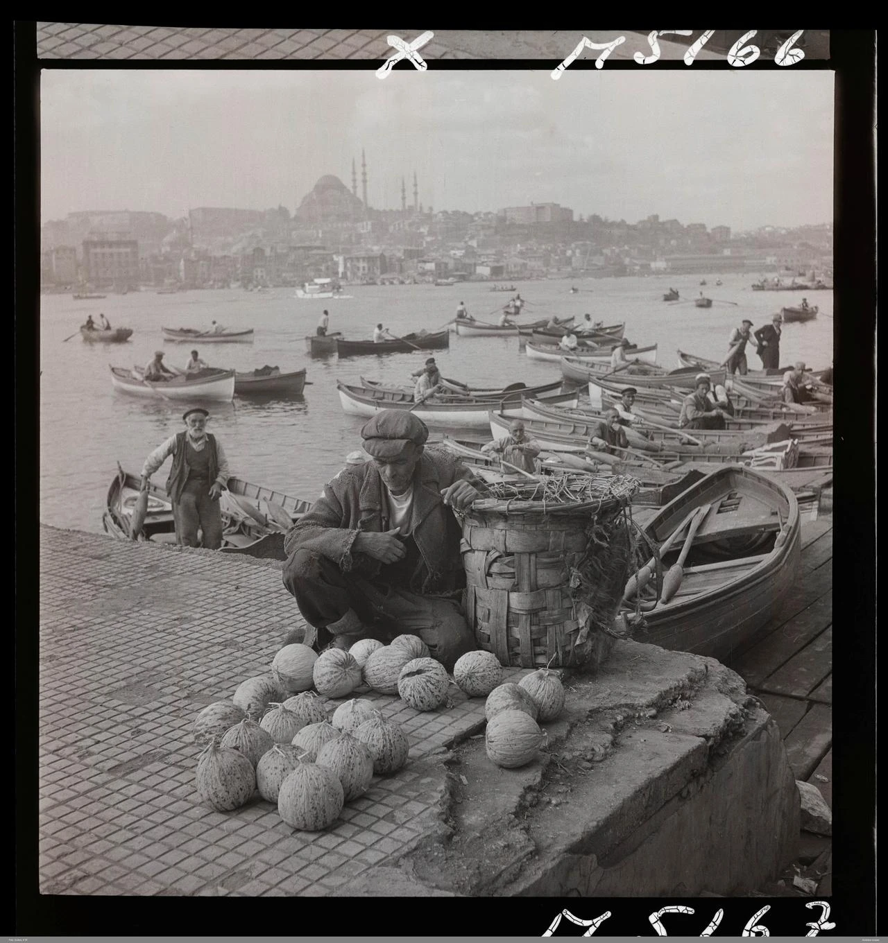 Melon vendor, scenes reflecting daily life against the backdrop of the historic Istanbul skyline. (AA Photo)