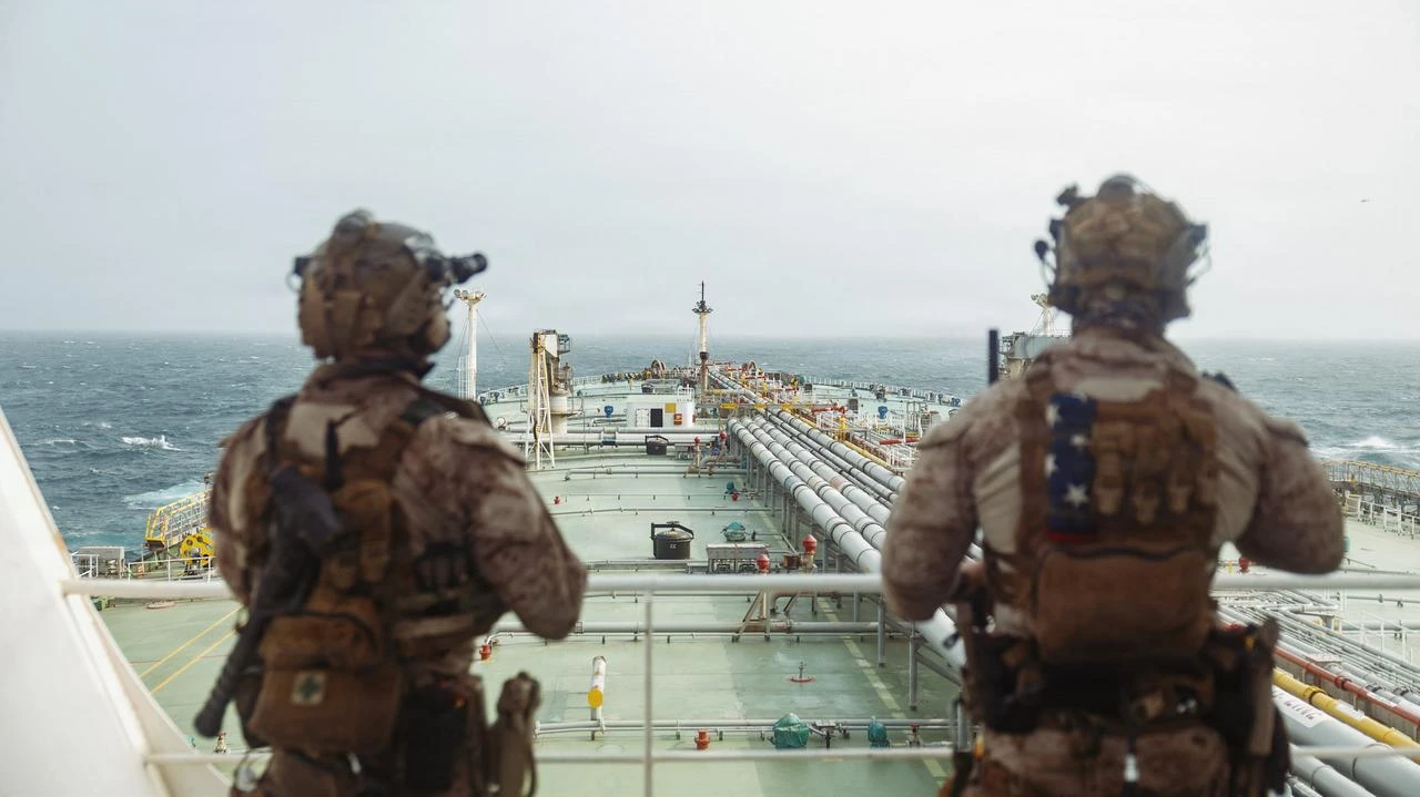 This US Marine Corps handout photograph taken on July 16, 2026, by US Central Command Public Affairs reportedly shows US Marines from the 11th Marine Expeditionary Unit conducting a verification boarding aboard M/T Wen Yao in the Gulf of Oman. (Photo by US MARINE CORPS / AFP)